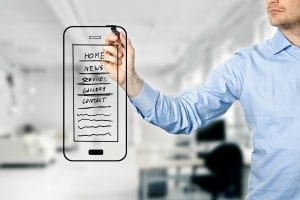 designer drawing mobile website development wireframe