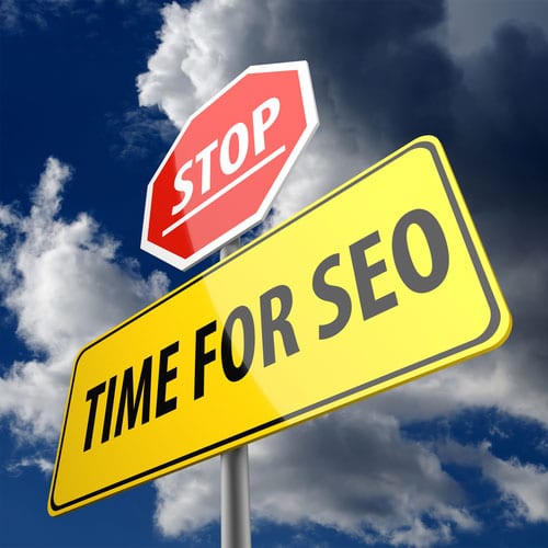 A sign saying stop, time for seo