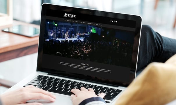 Avenue website design on laptop